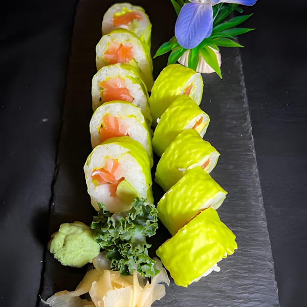 Siam Orchid's vibrant green sushi rolls with salmon and avocado, served with wasabi and ginger.